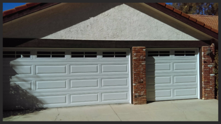 Installed new long panel sectional door in White